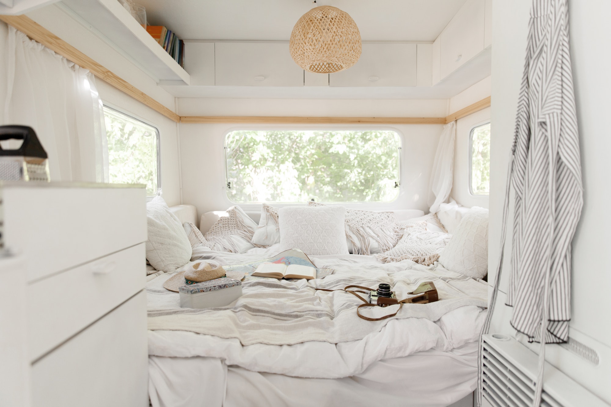 camping-in-a-trailer-rv-bedroom-interior-nobody.jpg